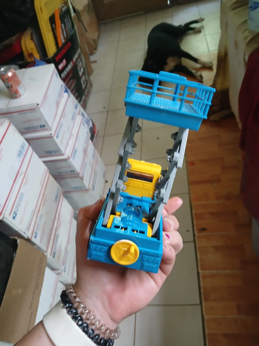 toy is a Driven by Battat Micro Series Scissor Lift Truck.